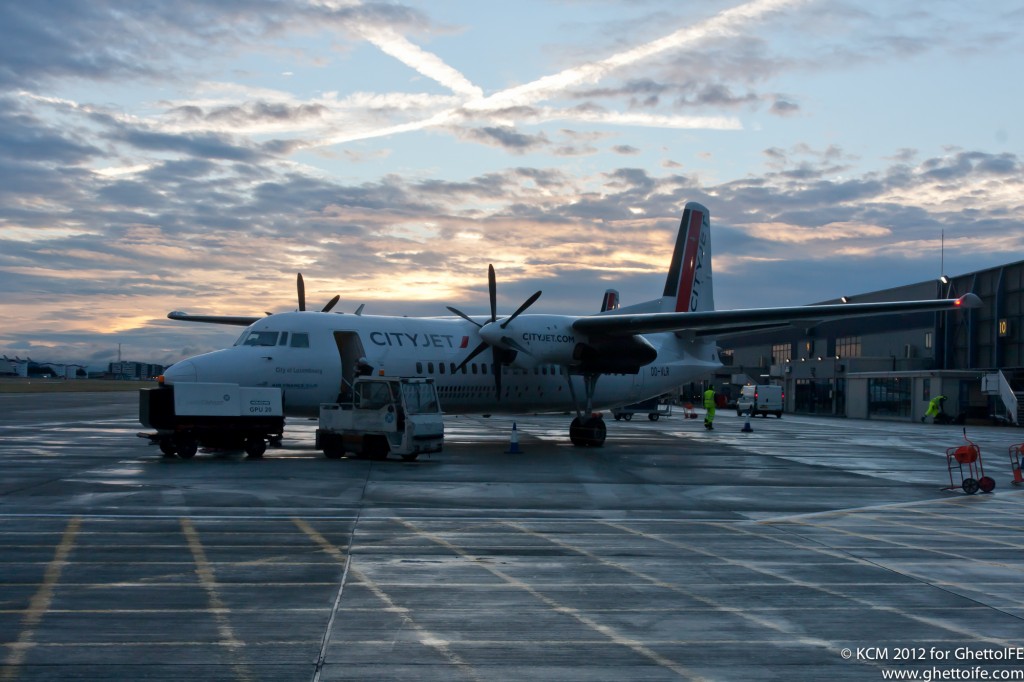 CityJet Fokker 50 as used on Cambridge operated routes. This Fokker 50 is at London City Airport - Image GhettoIFE.